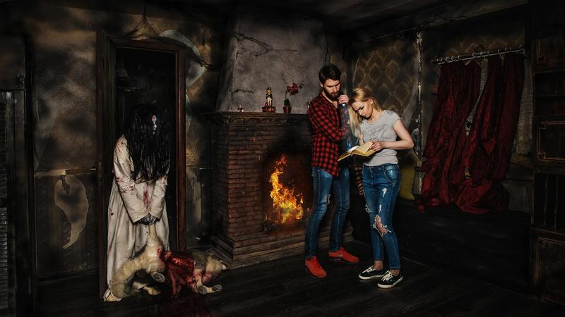 Couple solves puzzles in a horror escape room